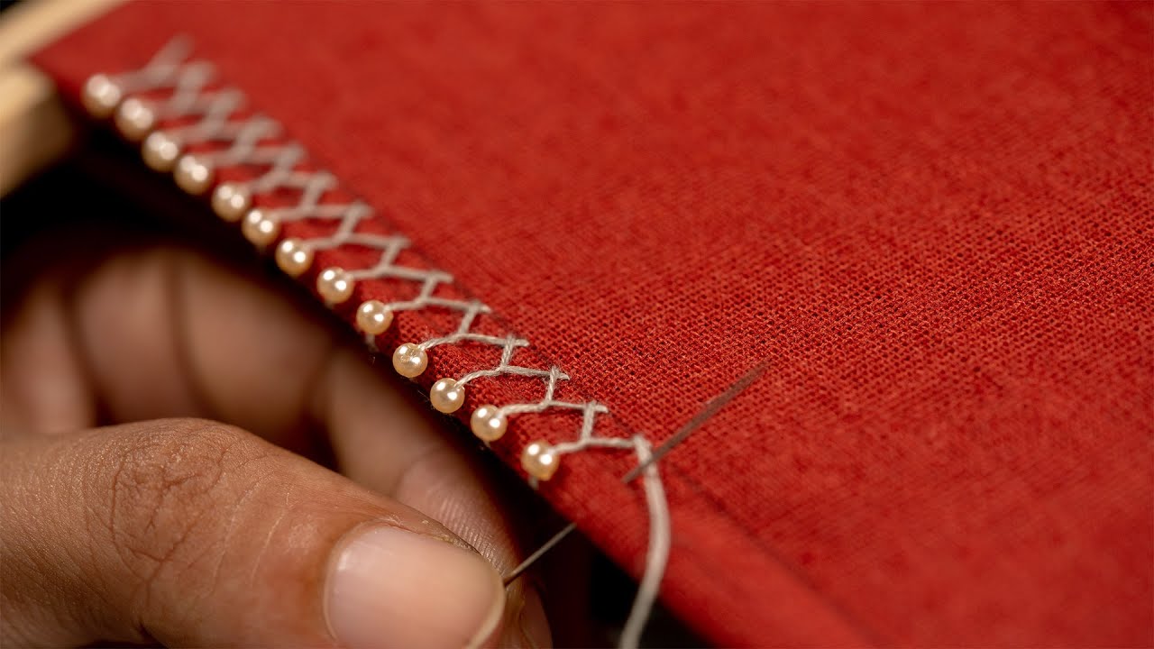 stitching beads on fabric