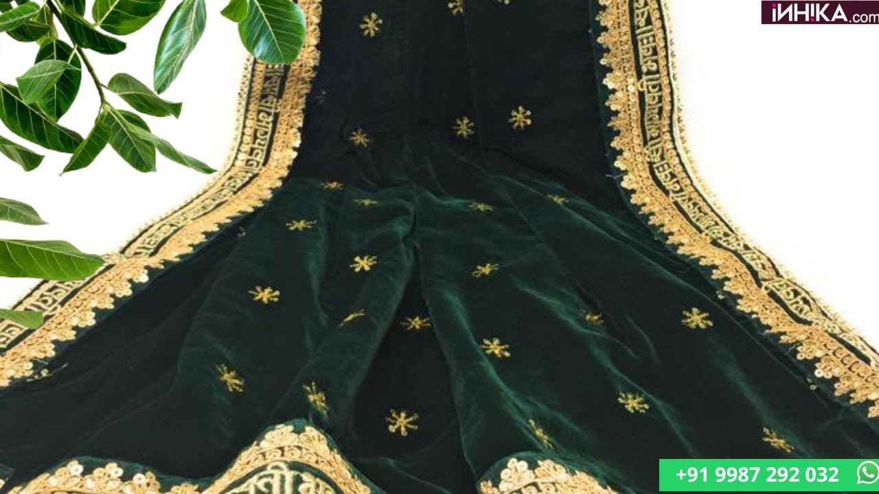 green embroidered fabric
