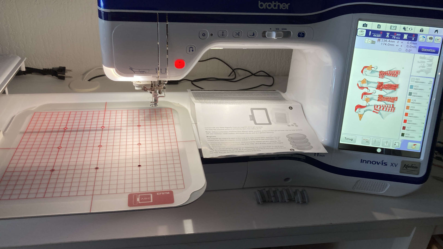 threading an embroidery needle